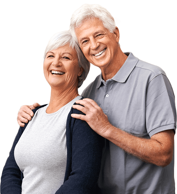 Older couple with healthy beautiful smiles