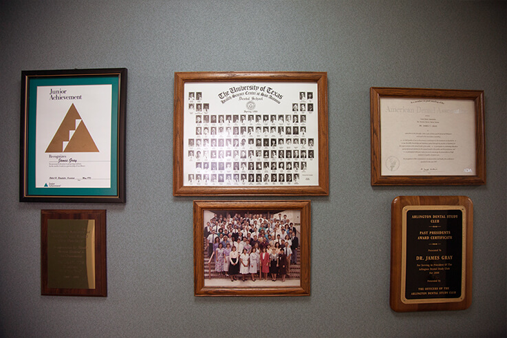 Wall displaying Dr. Gray's training and educational achievements