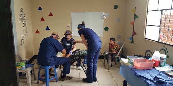 Patients receiving treatment on mission trip