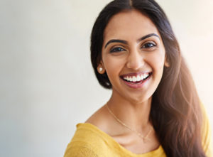 Woman with beautiful smile following teeth whitening 