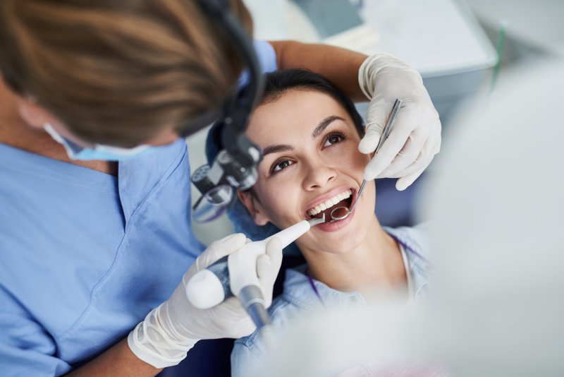 a young female having dental work performed thanks to her stimulus money