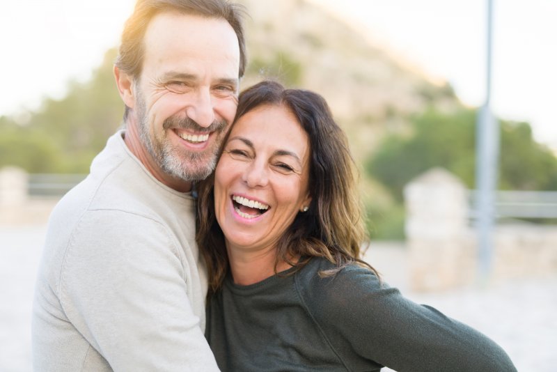 older couple smiling after Invisalign in Arlington