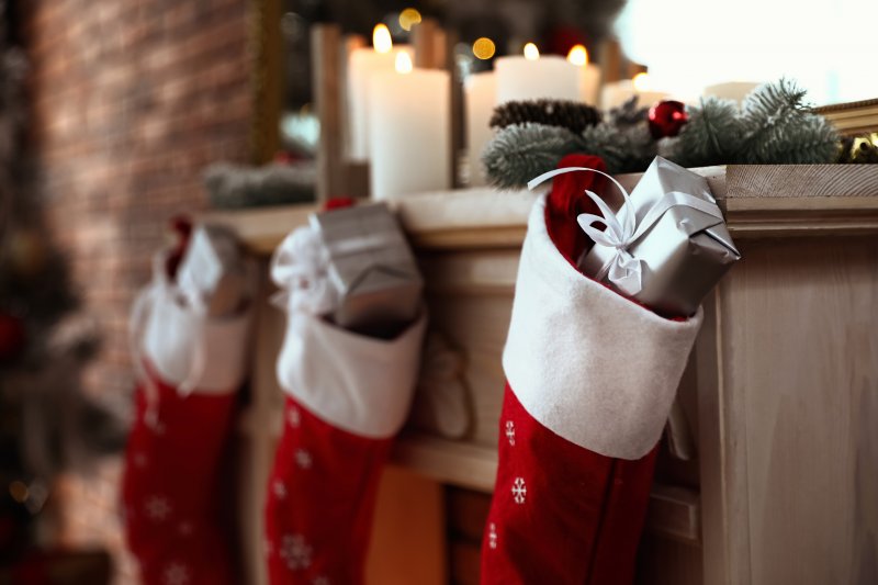 Christmas stockings hanging on fireplace